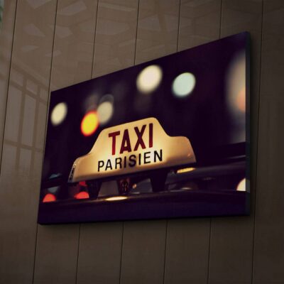 Canvastavla med LED-belysning 45x70 cm - Taxi-skylt med fransk text i stadsmiljö - Gult / Svart / Rött